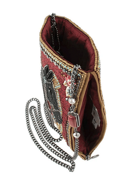 Mary Frances MINI S002-255 LETS GALLOP Mini Crossbody Clutch Burgundy inside view. If you need any assistance with this item or the purchase of this item please call us at five six one seven four eight eight eight zero one Monday through Saturday 10:00a.m EST to 8:00 p.m EST