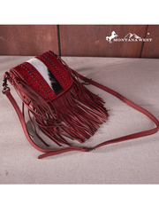 Montana West RLC-L168RD Womens Genuine Leather Tooled Fringe Crossbody Bag Red side view. If you need any assistance with this item or the purchase of this item please call us at five six one seven four eight eight eight zero one Monday through Saturday 10:00a.m EST to 8:00 p.m EST