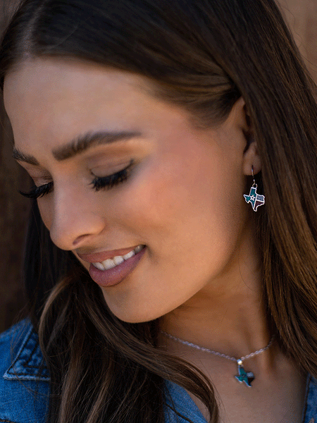 Montana Silversmiths ER5619 Womens Texas Forever Earrings Silver on model. If you need any assistance with this item or the purchase of this item please call us at five six one seven four eight eight eight zero one Monday through Saturday 10:00a.m EST to 8:00 p.m EST