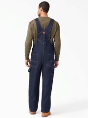 Dickies 83294NB Mens Indigo Bib Overalls Navy Blue back view regular. If you need any assistance with this item or the purchase of this item please call us at five six one seven four eight eight eight zero one Monday through Saturday 10:00a.m EST to 8:00 p.m EST