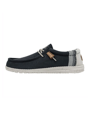 Hey Dude 40015-410 Mens Wally Break Stitch Shoe Navy side view. If you need any assistance with this item or the purchase of this item please call us at five six one seven four eight eight eight zero one Monday through Saturday 10:00a.m EST to 8:00 p.m EST