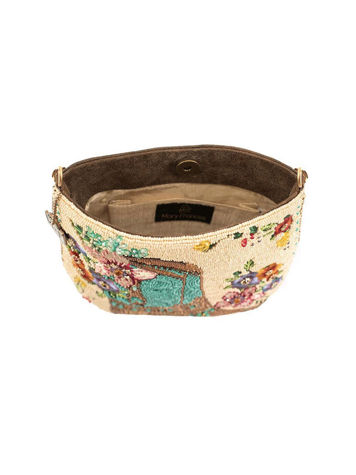 Mary Frances BAG S002-383 LINE DANCE Crossbody Handbag Cream front view. If you need any assistance with this item or the purchase of this item please call us at five six one seven four eight eight eight zero one Monday through Saturday 10:00a.m EST to 8:00 p.m EST