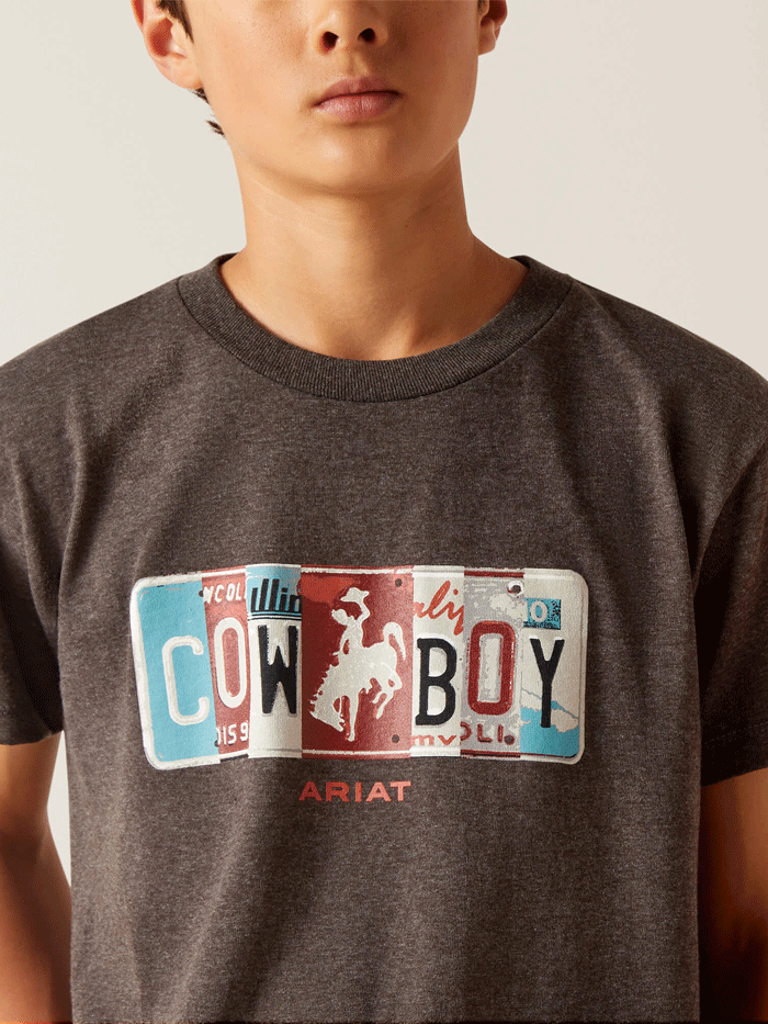 Ariat 10047911 Kids License Plate Cowboy T-Shirt Charcoal Heather front view. If you need any assistance with this item or the purchase of this item please call us at five six one seven four eight eight eight zero one Monday through Saturday 10:00a.m EST to 8:00 p.m EST