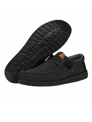 Hey Dude 40296-060 Mens Wally Washed Canvas Shoe Black sole and side view. If you need any assistance with this item or the purchase of this item please call us at five six one seven four eight eight eight zero one Monday through Saturday 10:00a.m EST to 8:00 p.m EST