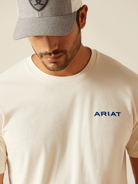 Ariat 10051454 Mens Logo Short Sleeve T-Shirt Off White close up view of front. If you need any assistance with this item or the purchase of this item please call us at five six one seven four eight eight eight zero one Monday through Saturday 10:00a.m EST to 8:00 p.m EST