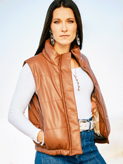 Ariat 10053981 Womens Swirls Faux Leather Vest Soft Silt Brown alternate model. If you need any assistance with this item or the purchase of this item please call us at five six one seven four eight eight eight zero one Monday through Saturday 10:00a.m EST to 8:00 p.m EST