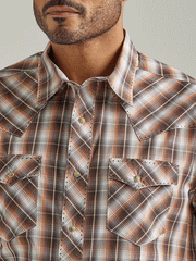 Wrangler 112326466 Mens Long Sleeve Fashion Western Snap Plaid Shirt Tawny Brown front close up. If you need any assistance with this item or the purchase of this item please call us at five six one seven four eight eight eight zero one Monday through Saturday 10:00a.m EST to 8:00 p.m EST