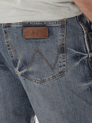 Wrangler 77MWZGL Mens Retro Slim Bootcut Jeans Greeley back pocket close up view. If you need any assistance with this item or the purchase of this item please call us at five six one seven four eight eight eight zero one Monday through Saturday 10:00a.m EST to 8:00 p.m EST