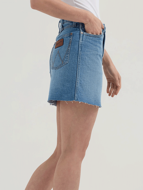 Wrangler 112364627 Womens Retro Bailey Denim Skirt River Blue side view. If you need any assistance with this item or the purchase of this item please call us at five six one seven four eight eight eight zero one Monday through Saturday 10:00a.m EST to 8:00 p.m EST

