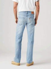 Levi's 055270723 Mens 527 Slim Stretch Boot Cut Jean Medium Wash back view on model. If you need any assistance with this item or the purchase of this item please call us at five six one seven four eight eight eight zero one Monday through Saturday 10:00a.m EST to 8:00 p.m EST