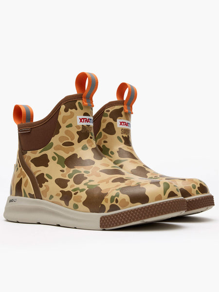 Xtratuf XADSMDCM Mens Sport Ankle Deck Boot Duck Camo side  /front view pair. If you need any assistance with this item or the purchase of this item please call us at five six one seven four eight eight eight zero one Monday through Saturday 10:00a.m EST to 8:00 p.m EST