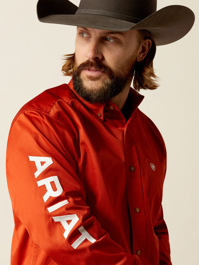 Ariat 10052823 Mens Team Logo Twill Classic Fit Shirt Dark Orange Coral front view. If you need any assistance with this item or the purchase of this item please call us at five six one seven four eight eight eight zero one Monday through Saturday 10:00a.m EST to 8:00 p.m EST