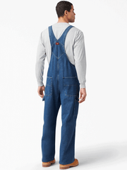 Dickies 8396SNB Mens Bib Overall Indigo Stone Washed back view regular. If you need any assistance with this item or the purchase of this item please call us at five six one seven four eight eight eight zero one Monday through Saturday 10:00a.m EST to 8:00 p.m EST