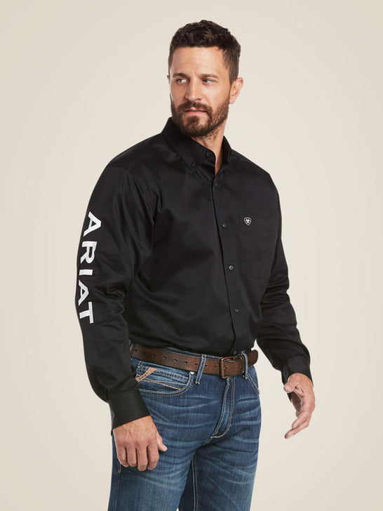 Ariat 10017497 Mens Team Logo Twill Classic Fit Shirt Black front view. If you need any assistance with this item or the purchase of this item please call us at five six one seven four eight eight eight zero one Monday through Saturday 10:00a.m EST to 8:00 p.m EST