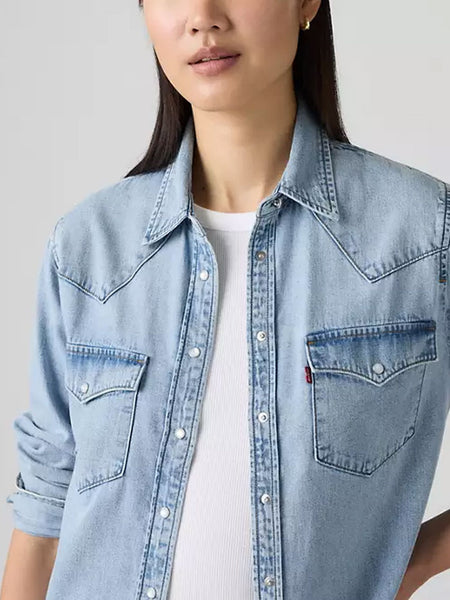Levi's 868320049 Womens The Ultimate Western Shirt Ig Discussion Blue front close up. If you need any assistance with this item or the purchase of this item please call us at five six one seven four eight eight eight zero one Monday through Saturday 10:00a.m EST to 8:00 p.m EST