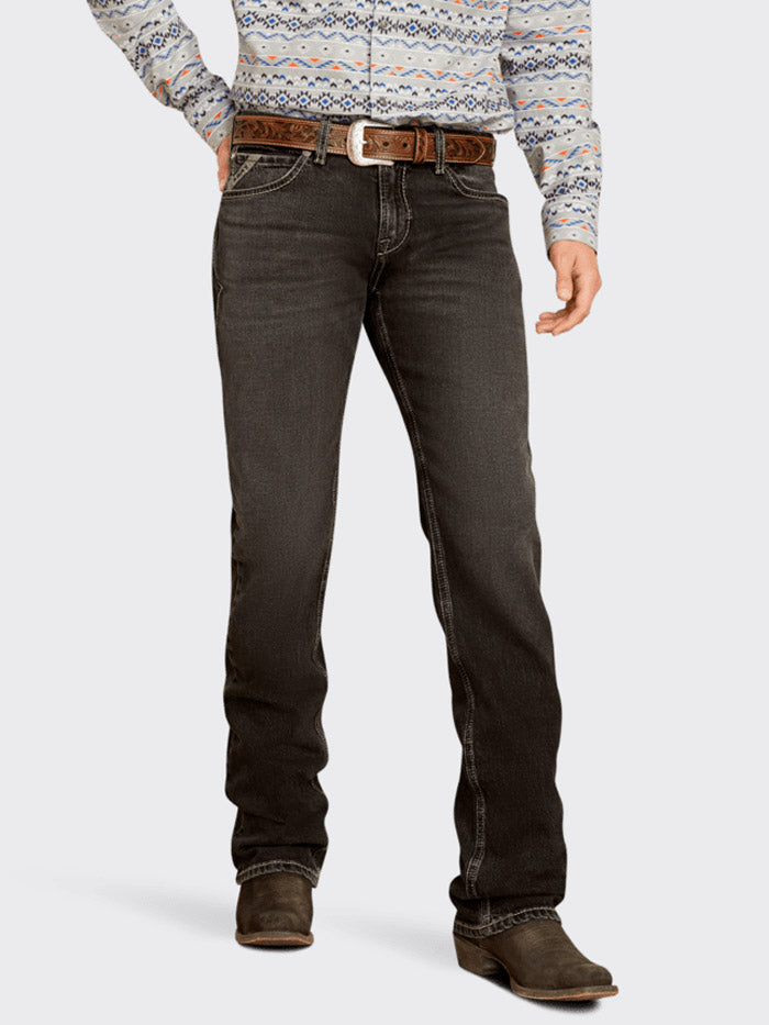 Ariat 10051872 Mens M7 Slim Onyx Straight Leg Jeans Ebony Black front view. If you need any assistance with this item or the purchase of this item please call us at five six one seven four eight eight eight zero one Monday through Saturday 10:00a.m EST to 8:00 p.m EST
