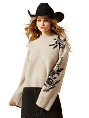Ariat 10065989 Womens All In Embellished Sweater Oatmeal Heather front view. If you need any assistance with this item or the purchase of this item please call us at five six one seven four eight eight eight zero one Monday through Saturday 10:00a.m EST to 8:00 p.m EST