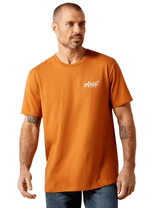 Ariat 10065902 Mens Coyote Country T-Shirt Adobe Copper front view. If you need any assistance with this item or the purchase of this item please call us at five six one seven four eight eight eight zero one Monday through Saturday 10:00a.m EST to 8:00 p.m EST
