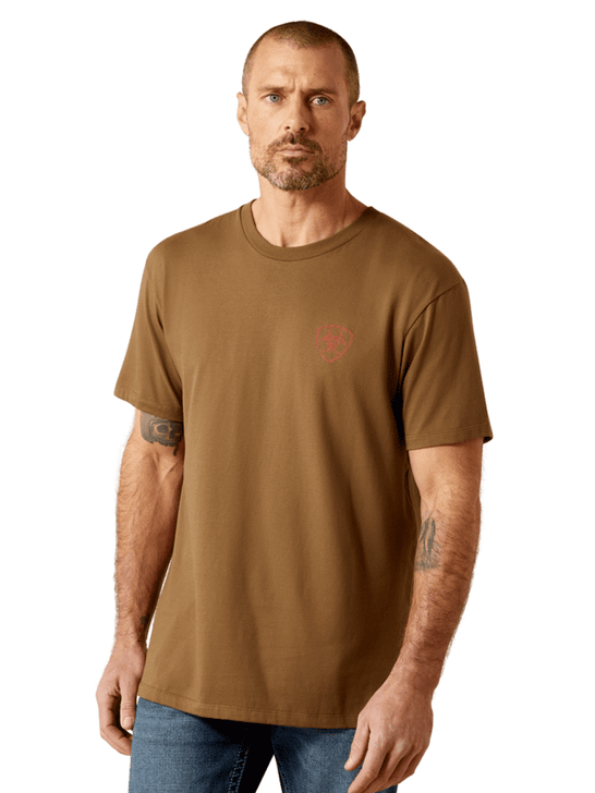 Ariat 10065890 Mens Stone Arrowhead T-Shirt Teak front view. If you need any assistance with this item or the purchase of this item please call us at five six one seven four eight eight eight zero one Monday through Saturday 10:00a.m EST to 8:00 p.m EST