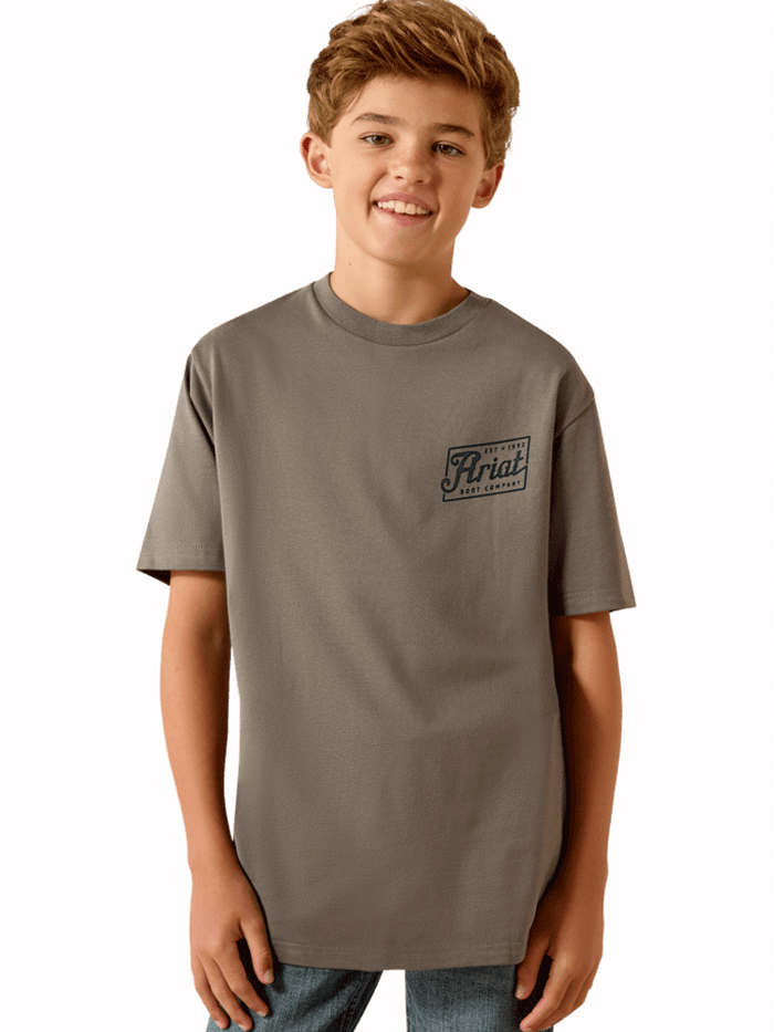 Ariat 10071180 Youth Patriot T-Shirt Smoked Pearl Grey back view. If you need any assistance with this item or the purchase of this item please call us at five six one seven four eight eight eight zero one Monday through Saturday 10:00a.m EST to 8:00 p.m EST
