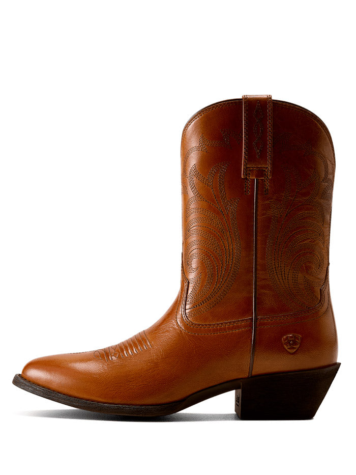 Ariat 10080379 Womens Heritage Noir R Toe Western Boot Dressy Cognac side / front view. If you need any assistance with this item or the purchase of this item please call us at five six one seven four eight eight eight zero one Monday through Saturday 10:00a.m EST to 8:00 p.m EST