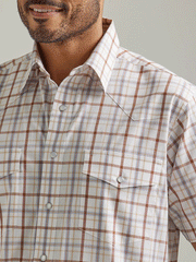 Wrangler 112326365 Mens Wrinkle Resist Short Sleeve Western Snap Plaid Shirt Dune Brown front close up of collar and pocket. If you need any assistance with this item or the purchase of this item please call us at five six one seven four eight eight eight zero one Monday through Saturday 10:00a.m EST to 8:00 p.m EST