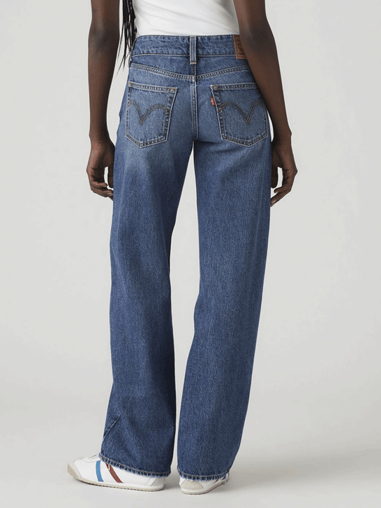Levi's A74980008 Womens Superlow Loose Jeans Blended Beauty Blue back view. If you need any assistance with this item or the purchase of this item please call us at five six one seven four eight eight eight zero one Monday through Saturday 10:00a.m EST to 8:00 p.m EST

