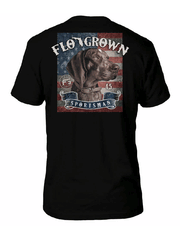 FloGrown FGM-1612 Mens Stand By The Flag Tee Black back view. If you need any assistance with this item or the purchase of this item please call us at five six one seven four eight eight eight zero one Monday through Saturday 10:00a.m EST to 8:00 p.m EST