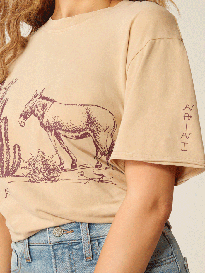 Ariat 10052610 Womens Burro Tee Irish Cream Mineral Wash front view tucked in. If you need any assistance with this item or the purchase of this item please call us at five six one seven four eight eight eight zero one Monday through Saturday 10:00a.m EST to 8:00 p.m EST