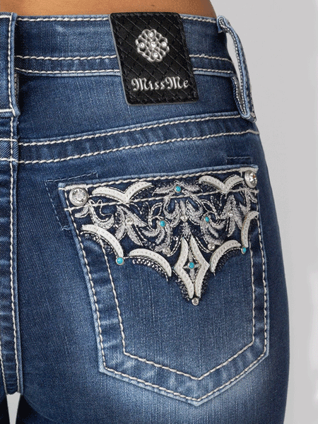 Miss Me M9191B Womens Mid-Rise Boot Jean Dark Blue back pocket close up. If you need any assistance with this item or the purchase of this item please call us at five six one seven four eight eight eight zero one Monday through Saturday 10:00a.m EST to 8:00 p.m EST