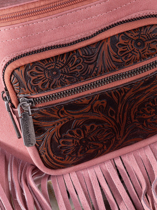 Montana West MW1276-194PK Womens Floral Tooled Fringe Fanny Pack Pink close up. If you need any assistance with this item or the purchase of this item please call us at five six one seven four eight eight eight zero one Monday through Saturday 10:00a.m EST to 8:00 p.m EST