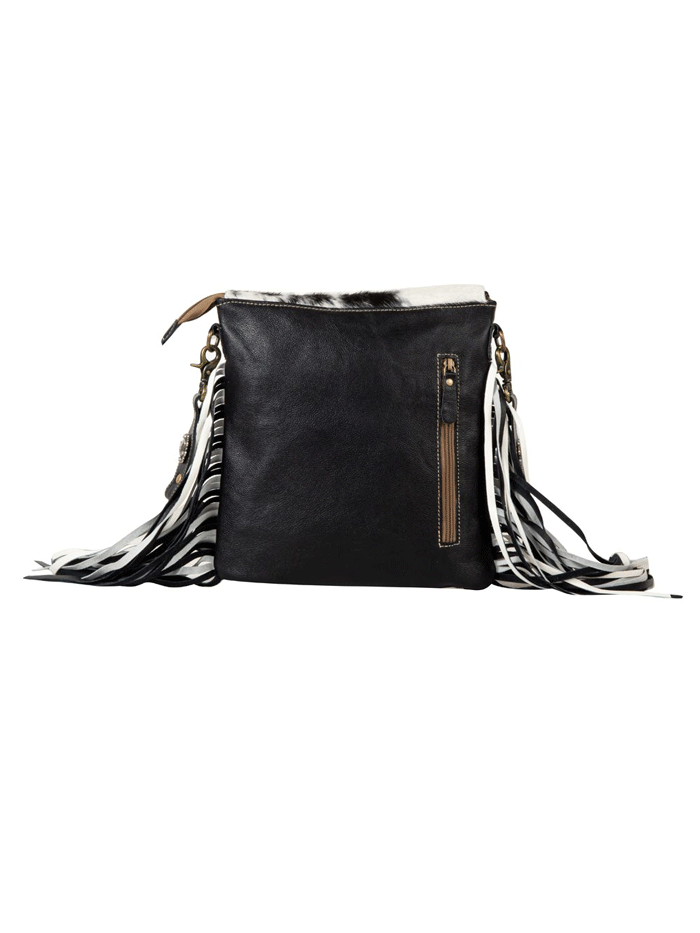 Myra Bag S-7949 Womens Stratford Trail Fringed Concealed-Carry Bag Black And White front view . If you need any assistance with this item or the purchase of this item please call us at five six one seven four eight eight eight zero one Monday through Saturday 10:00a.m EST to 8:00 p.m EST