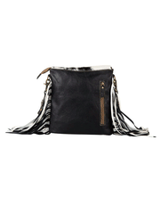Myra Bag S-7949 Womens Stratford Trail Fringed Concealed-Carry Bag Black And White back view standing. If you need any assistance with this item or the purchase of this item please call us at five six one seven four eight eight eight zero one Monday through Saturday 10:00a.m EST to 8:00 p.m EST