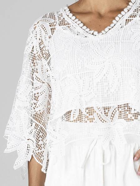 Miss Me MT2884L Womens Cropped Crochet Flowy Top White front close up view. If you need any assistance with this item or the purchase of this item please call us at five six one seven four eight eight eight zero one Monday through Saturday 10:00a.m EST to 8:00 p.m EST