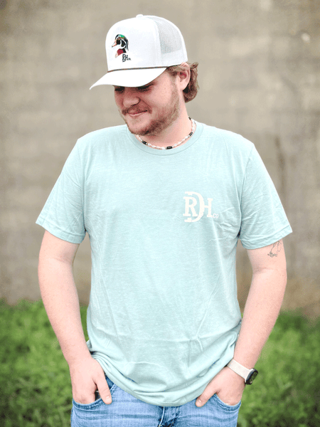 Red Dirt RDHC-T-182 Mens Big Duck Tee Energy Dusty Blue front view. If you need any assistance with this item or the purchase of this item please call us at five six one seven four eight eight eight zero one Monday through Saturday 10:00a.m EST to 8:00 p.m EST