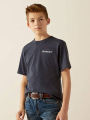 Ariat 10054066 Kids Camo Patriot T-Shirt Navy Heather front view. If you need any assistance with this item or the purchase of this item please call us at five six one seven four eight eight eight zero one Monday through Saturday 10:00a.m EST to 8:00 p.m EST