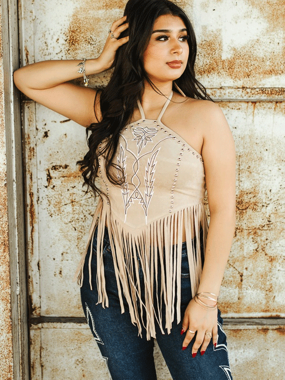 Lucky & Blessed TO844-SND Womens Suede Halter Fringed Top Sand front view on model. If you need any assistance with this item or the purchase of this item please call us at five six one seven four eight eight eight zero one Monday through Saturday 10:00a.m EST to 8:00 p.m EST