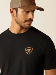 Ariat 10052017 Mens Eagle Freedom T-Shirt Black front close up view. If you need any assistance with this item or the purchase of this item please call us at five six one seven four eight eight eight zero one Monday through Saturday 10:00a.m EST to 8:00 p.m EST