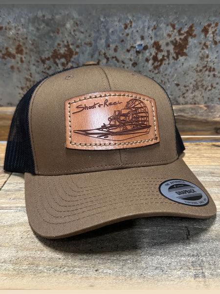 Shoot & Reel SR8 Air Boat Patch Curved Bill Cap Coyote Brown Black side / front view. If you need any assistance with this item or the purchase of this item please call us at five six one seven four eight eight eight zero one Monday through Saturday 10:00a.m EST to 8:00 p.m EST