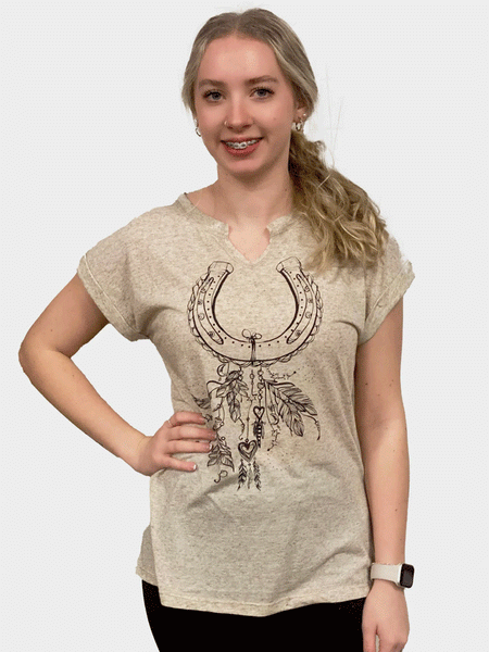 Liberty Wear 7001 Womens Horse Shoe And Feathers Tee Oat Natural front view. If you need any assistance with this item or the purchase of this item please call us at five six one seven four eight eight eight zero one Monday through Saturday 10:00a.m EST to 8:00 p.m EST