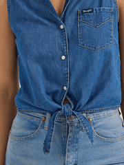 Wrangler 112360785 Womens Sleeveless Tie Front Shirt Mid Wash Denim front tie close up view. If you need any assistance with this item or the purchase of this item please call us at five six one seven four eight eight eight zero one Monday through Saturday 10:00a.m EST to 8:00 p.m EST

