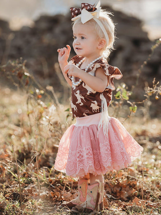 Shea Baby CS02 Kids Chiffon Skirt Pink view on model. If you need any assistance with this item or the purchase of this item please call us at five six one seven four eight eight eight zero one Monday through Saturday 10:00a.m EST to 8:00 p.m EST