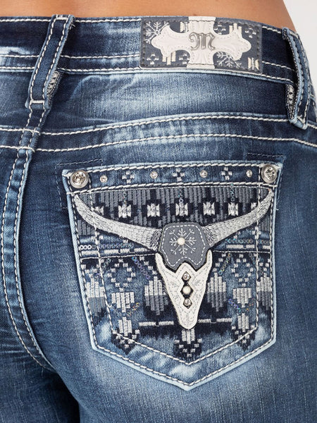 Miss Me M9236SB Womens Mid Rise Bootcut Jeans Medium Blue back pocket close up. If you need any assistance with this item or the purchase of this item please call us at five six one seven four eight eight eight zero one Monday through Saturday 10:00a.m EST to 8:00 p.m EST