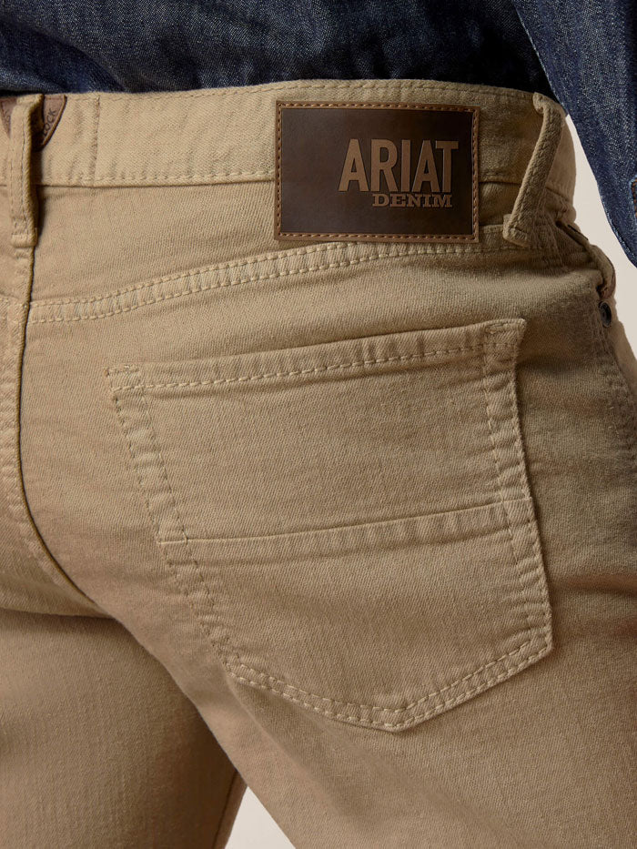 Ariat 10044369 Mens M7 Grizzly Straight Jean Dark Khaki front view. If you need any assistance with this item or the purchase of this item please call us at five six one seven four eight eight eight zero one Monday through Saturday 10:00a.m EST to 8:00 p.m EST
