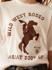 Ariat 10058863 Kids Wild West Rodeo T-Shirt Pink Tint close up. If you need any assistance with this item or the purchase of this item please call us at five six one seven four eight eight eight zero one Monday through Saturday 10:00a.m EST to 8:00 p.m EST