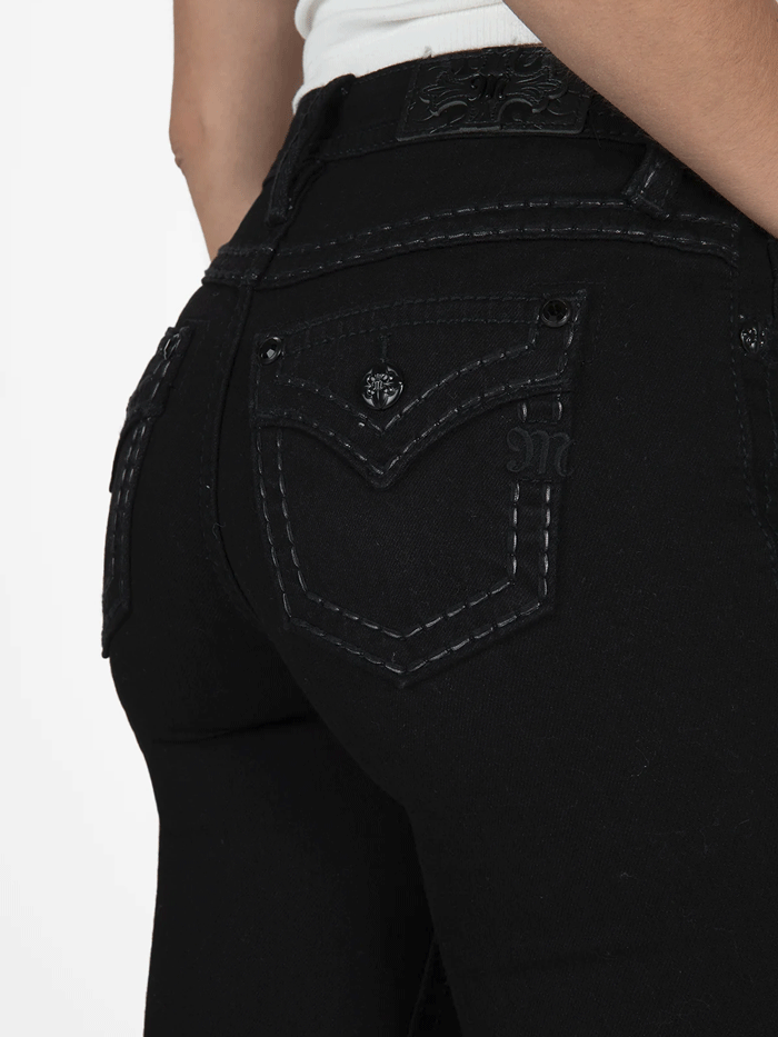 Miss Me M5014B397 Womens Classic Mid Rise Bootcut Jean Black full back view. If you need any assistance with this item or the purchase of this item please call us at five six one seven four eight eight eight zero one Monday through Saturday 10:00a.m EST to 8:00 p.m EST