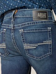 Ariat 10045385 Mens M8 Modern TekStretch Easton Slim Jean Galaxy back pocket close up view. If you need any assistance with this item or the purchase of this item please call us at five six one seven four eight eight eight zero one Monday through Saturday 10:00a.m EST to 8:00 p.m EST