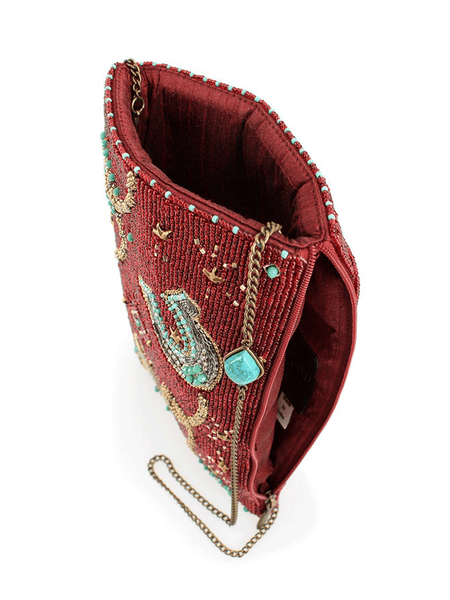 Mary Frances MINI S002-544 SADDLE UP Mini Crossbody Handbag Burgundy side view. If you need any assistance with this item or the purchase of this item please call us at five six one seven four eight eight eight zero one Monday through Saturday 10:00a.m EST to 8:00 p.m EST
