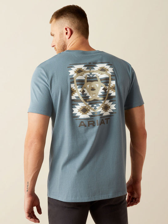 Ariat 10054832 Mens Eagle Rock T-Shirt Light Denim Blue back view. If you need any assistance with this item or the purchase of this item please call us at five six one seven four eight eight eight zero one Monday through Saturday 10:00a.m EST to 8:00 p.m EST