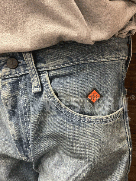 Wrangler FRCV42V Mens Flame Resistant Vintage Boot Jean Denim front pocket close up. If you need any assistance with this item or the purchase of this item please call us at five six one seven four eight eight eight zero one Monday through Saturday 10:00a.m EST to 8:00 p.m EST
